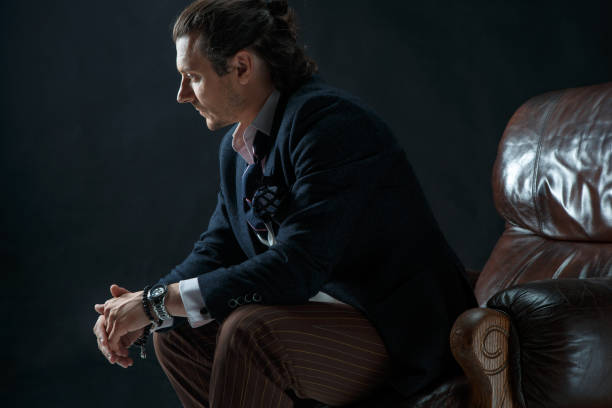 istock Businessman sitting on an armchair 856537622