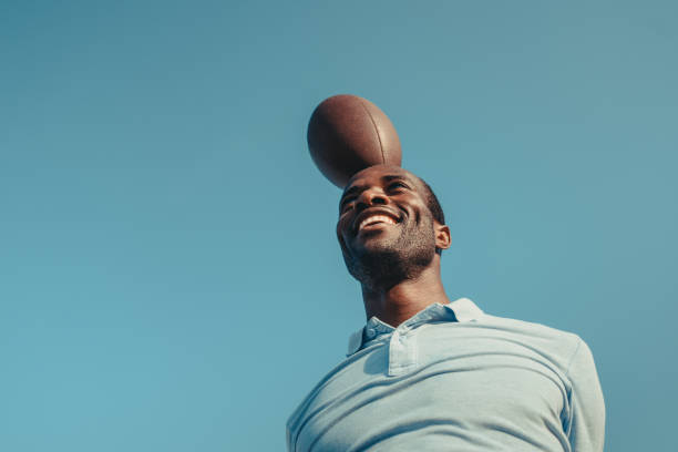 istock african american man with rugby ball 856537908