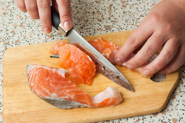 istock butchering of salmon 856543986
