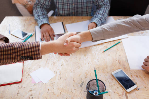istock Business partners shake hands in the conference room. 856544040