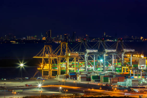istock Shipping containers Adjacent to Port Used for freight elevator large ships ,lighting conditions for the early evening. 856548702