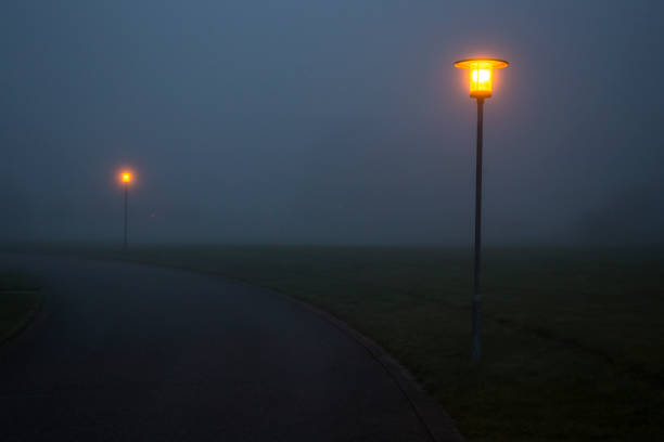 istock street lamps in mist 856552950