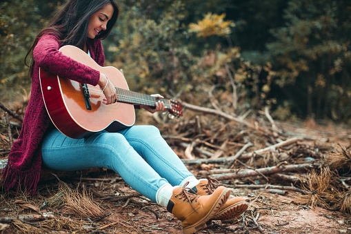 Young women with guitar