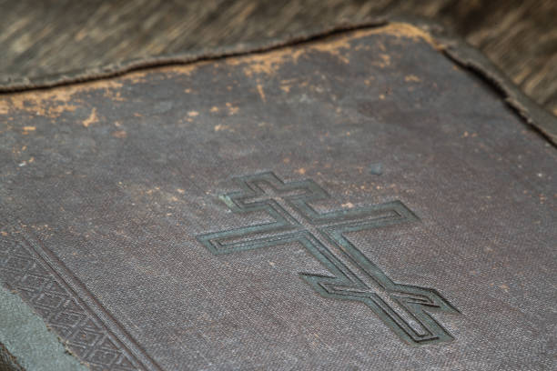 istock Old book on a wooden background 856562156