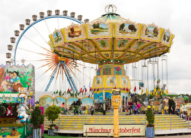 Munich: People in a chairoplane on the Oktoberfest in Munich, Germany on September 19, 2017. The Oktoberfest is the biggest beer festival of the world with over 6 million visitors each year.