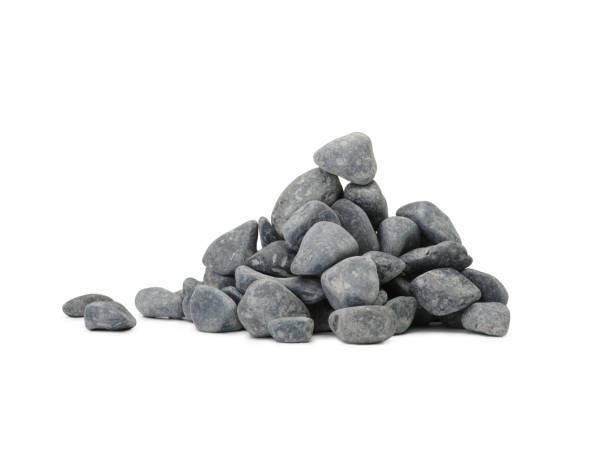 istock Handful of dark stones isolated on white background 856571966