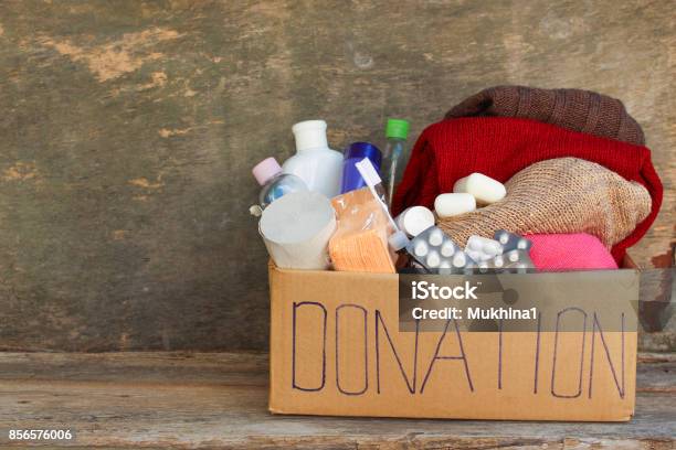 Donation Box With Clothes Living Essentials Stock Photo - Download Image Now - Charitable Donation, Donation Box, Hygiene