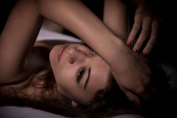 istock Sexy beautiful brunette woman in bed 856578754