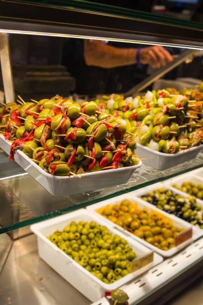 istock Stuffed olives canape in market 856579546
