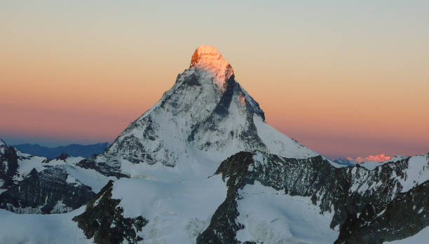 istock sunrise over the Matterhorn 856592198