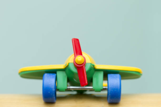 istock Children's toy airplane on a blue background 856597118