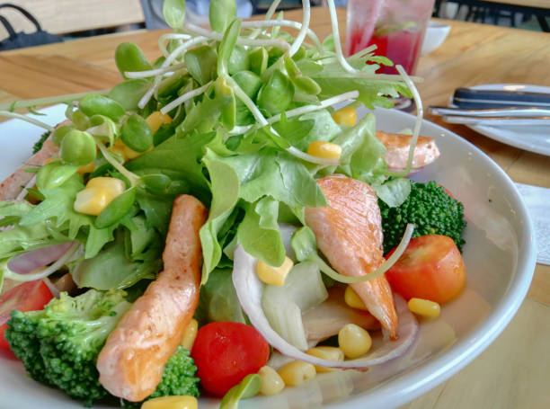 istock Soft focused picture of Salmon steak salad with vegetable 856600012