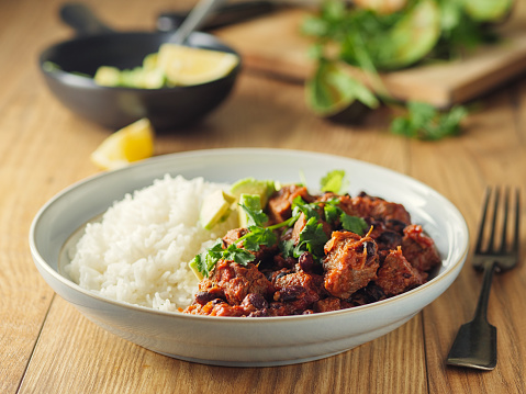 Home made freshness  chunk beef Chilli con carne service with jasmine rice and freshness avocado and sour cream