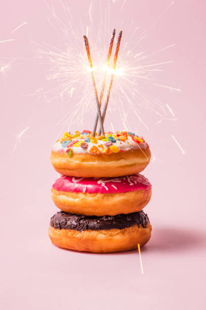 istock Delicious donuts for birthday 856607550