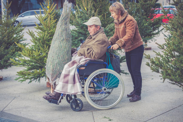 istock Senior Father and Daughter Shopping Christmas Tree 856612368