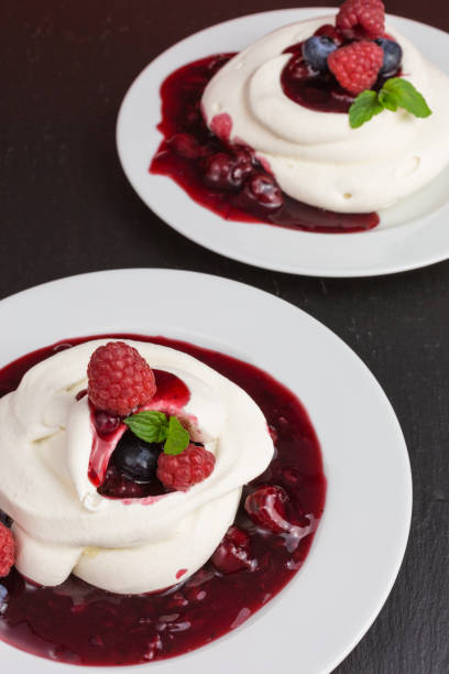 istock pavlova meringue with berries 856618332