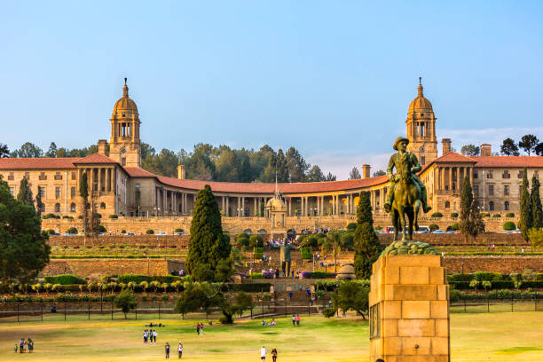 The Union Buildings in Pretoria, South Africa The Union Buildings in Pretoria, South Africa, in the late afternoon on a Sunday with people and families enjoying the park gardens. union buildings stock pictures, royalty-free photos & images
