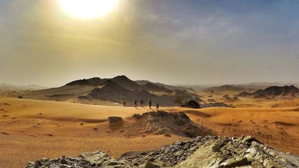 istock Trekking in the desert, dubai, UAE 856624694