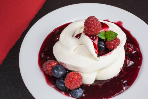 istock pavlova meringue with berries 856625124