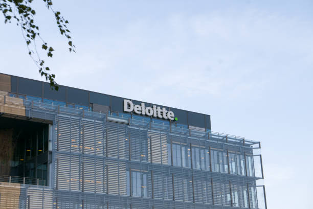 Deloitte hedquarters, modern building with the corporate logo stock photo