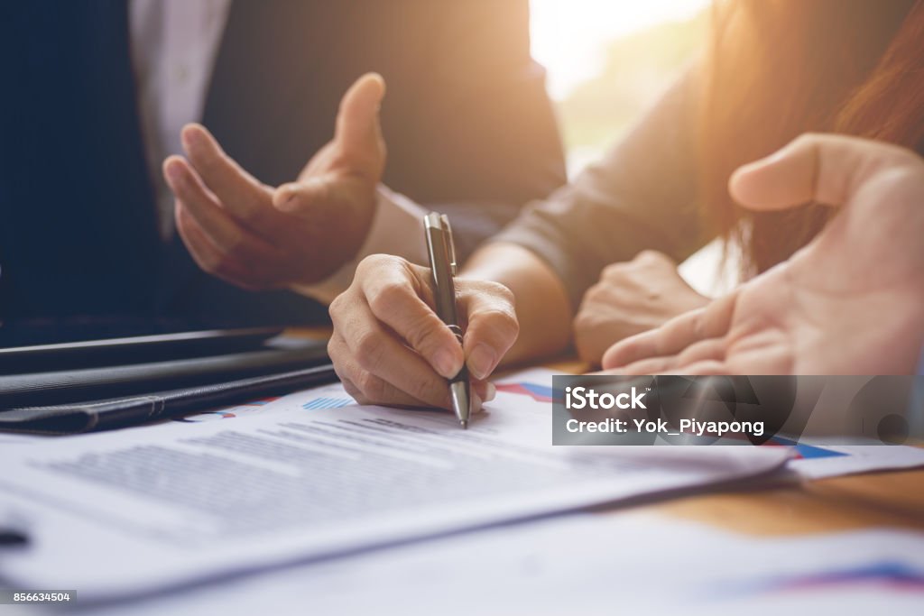 Business woman signing a contract document on office.teamwork successful Meeting Workplace strategy Concept Lawyer Stock Photo