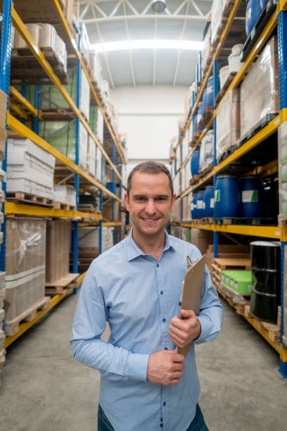 istock Happy man working at a warehouse 856634666