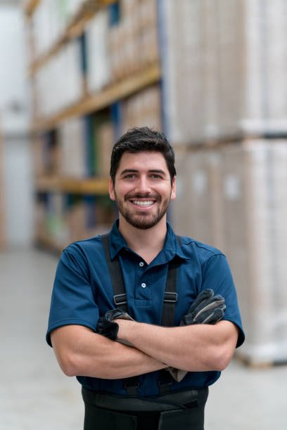istock Portrait of a happy man working at a warehouse 856634904