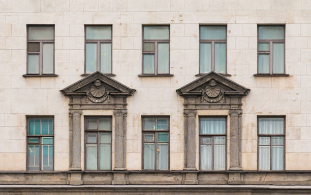 istock Windows in a row on facade of apartment building 856639042