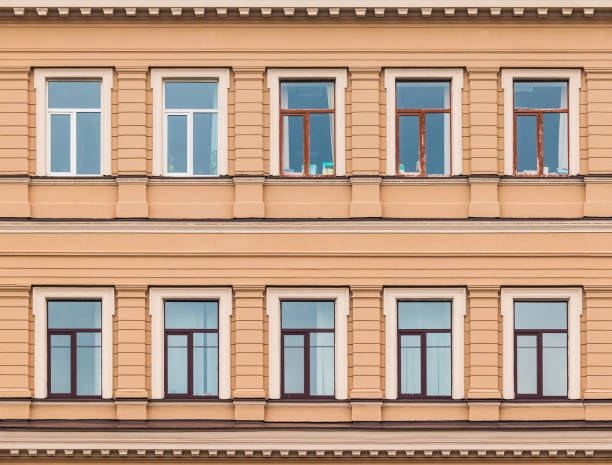istock Windows in a row on facade of office building 856641438