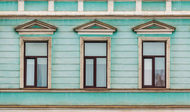 istock Windows in a row on facade of apartment building 856641518