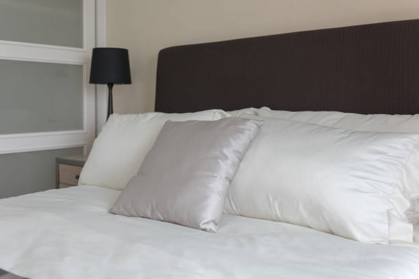 istock set of pillows on bed in modern bedroom 856641776