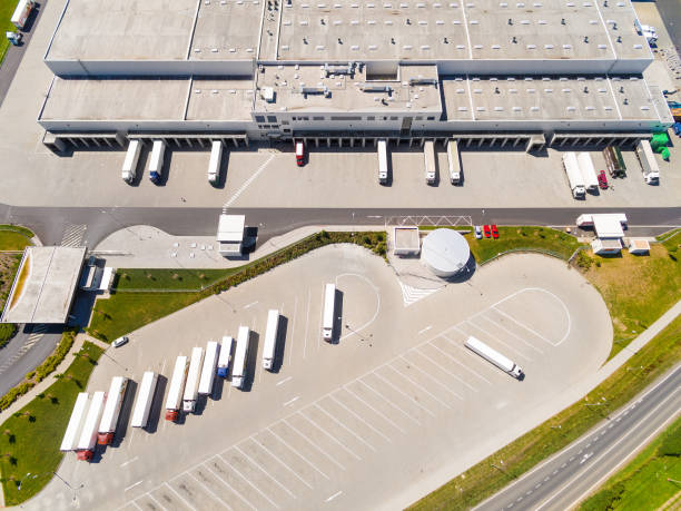 istock Aerial view of warehouse with trucks. 856648672