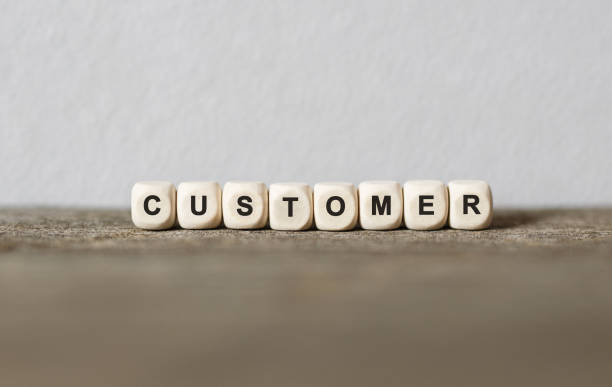 istock Word CUSTOMER made with wood building blocks 856653858