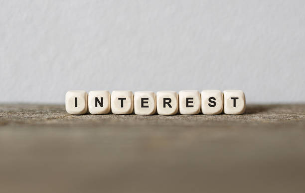 istock Word INTEREST made with wood building blocks 856656020