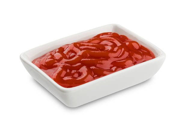 istock Ketchup in square bowl isolated on a white background 856659628
