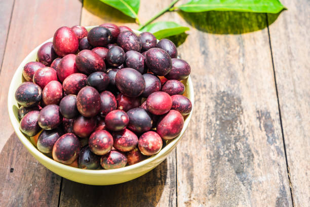 istock Karanda in a bowl on wooden background with Copy space 856660534