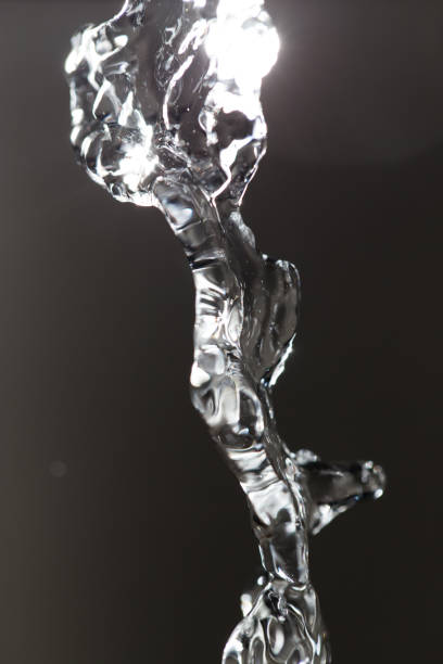 istock jet of water on black 856665312