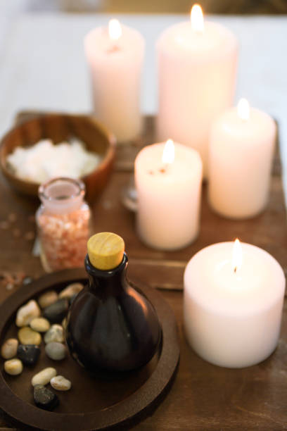 istock Essential massage oil salt and candles at spa 856671842