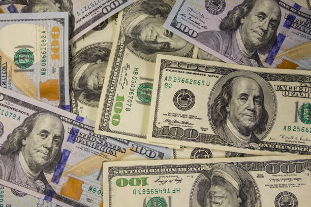 istock Background of the hundred dollar bills 856671864