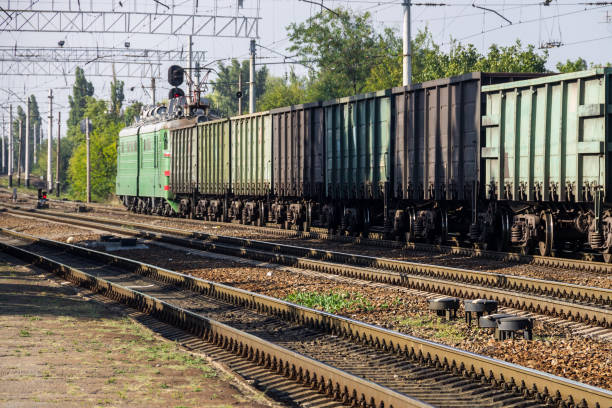 istock View on the railroad track and cargo train 856671970