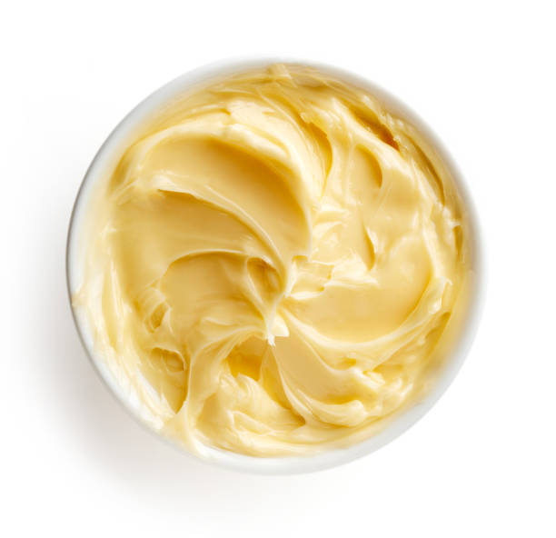 istock Bowl of butter on white background 856672088