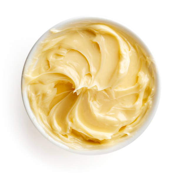 istock Bowl of butter on white background 856672096