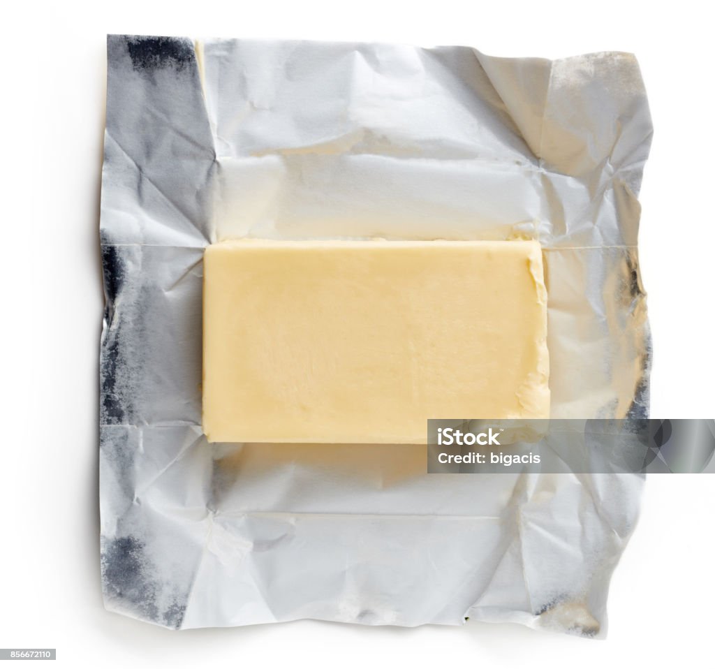 Butter package isolated on white Butter package isolated on white background, top view Butter Stock Photo
