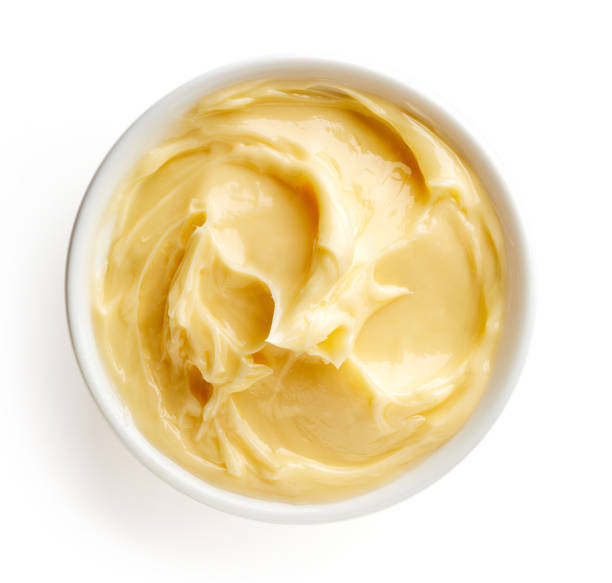 istock Bowl of butter on white background 856672142