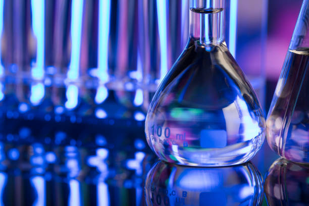 istock Science concept. Laboratory beakers. Colorful bokeh 856675564