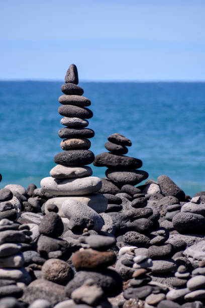 istock Stack of stones on the sea beach 856676256