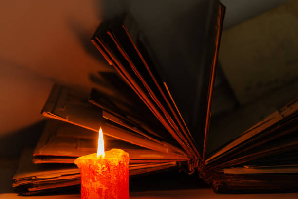 An old book and a candle