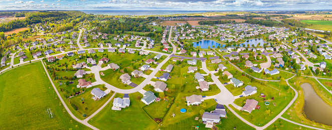 Beautiful Neighborhood with parks and ponds, panoramic aerial view.