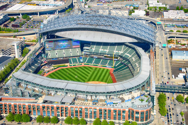 Safeco Field from Above Seattle, United States - June 6, 2016:  Safeco Field, the home of Major League Baseball's Seattle Mariners, as shot from an orbiting helicopter at an altitude of about 1000 feet on a clear summer afternoon. american league baseball stock pictures, royalty-free photos & images