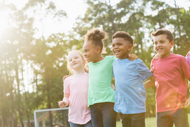 istock Multi-ethnic group of children a the park 856718544